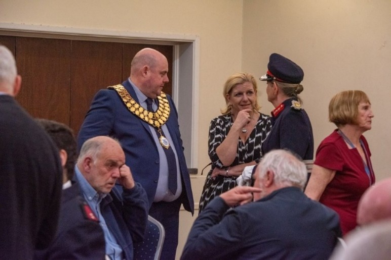 Deputy Town Mayor and the Town Clerk talking to the dignitaries